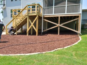 wood deck stone eding mulch sod