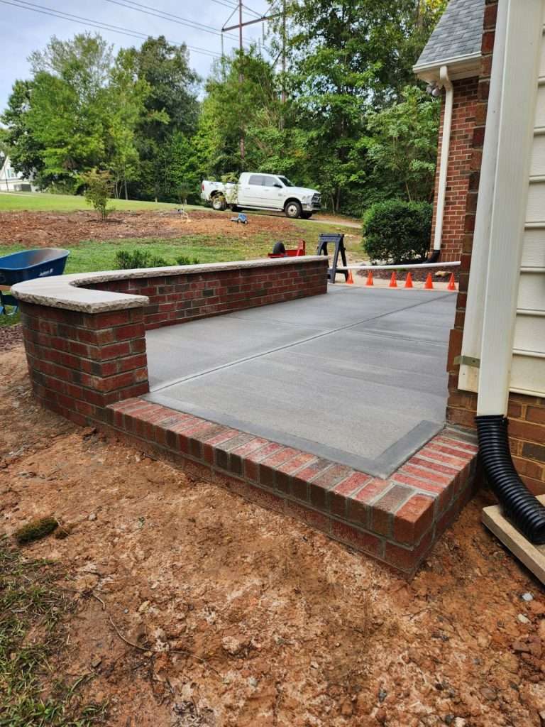 Brick Seatwall concrete patio