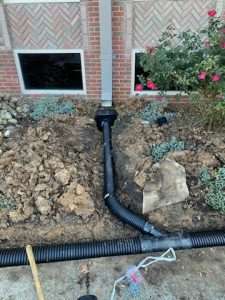 surface drain buried downspout