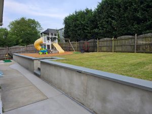 Concrete Retaining Wall Bluestone Grading Zoysia Sod Fuquay Varina