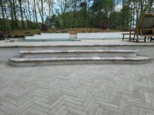 Herringbone Patio Brick Retaining Wall Travertine Coping Stairs Lighting Apex