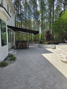 Herringbone Patio Brick Retaining Wall Travertine Coping Stairs Planting Apex 6